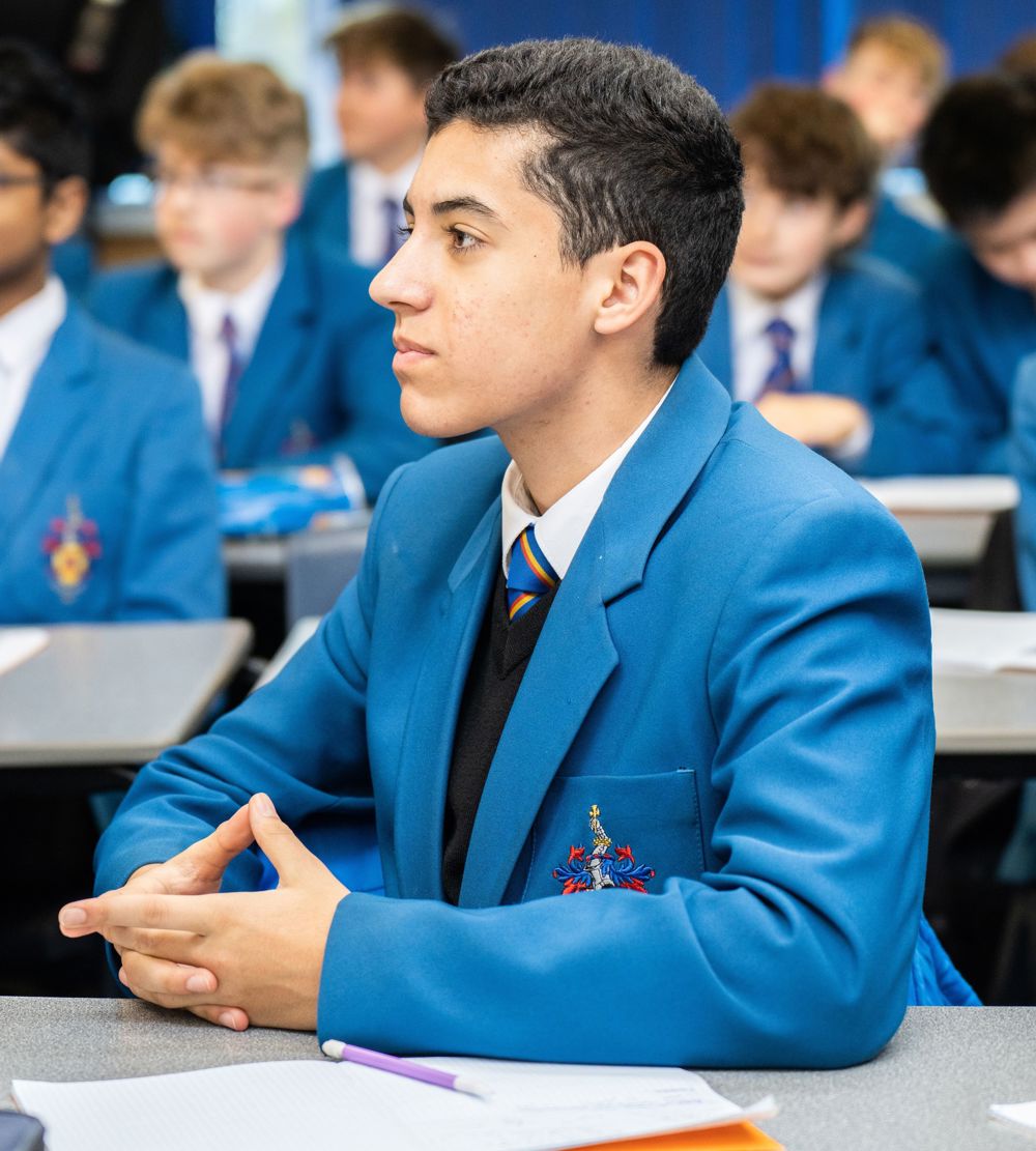 Student in class listening to teacher