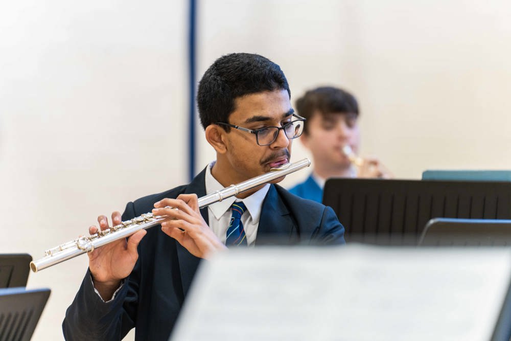 Sixth form student playing the flute