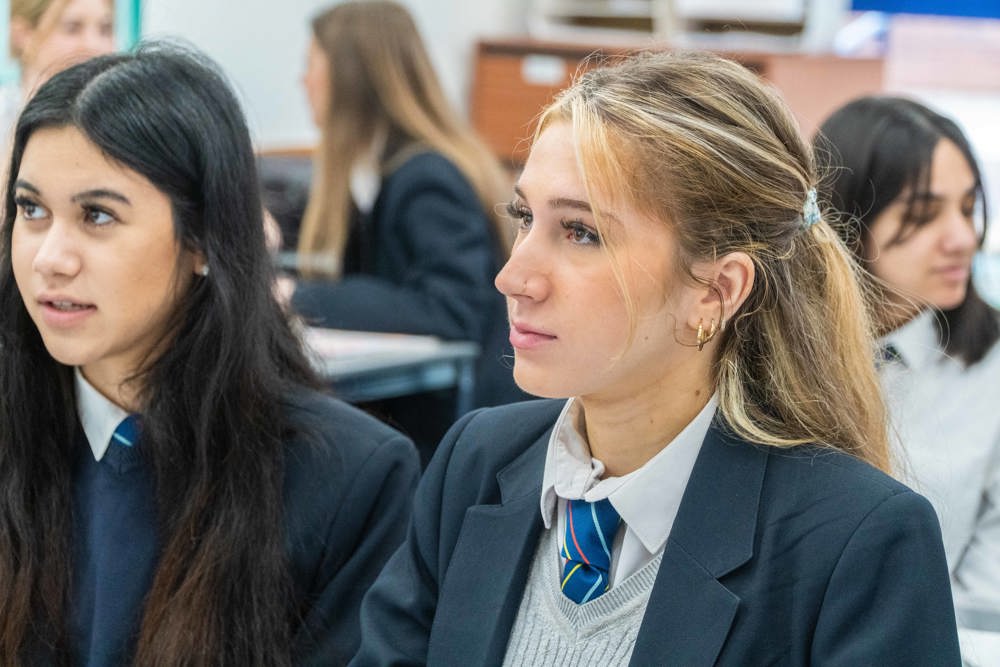 Two sixth form students in class