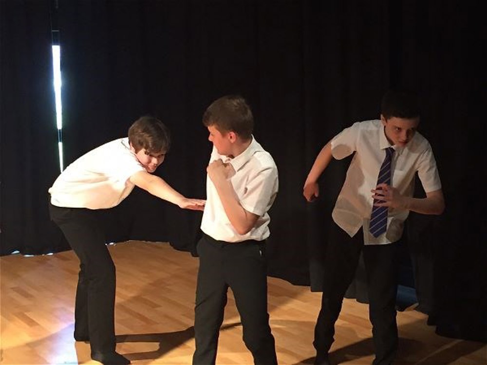 Year 7 performing for future pupils. - Image