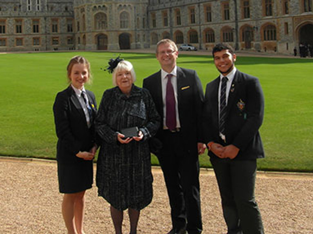  Chairman of Governors presented with MBE - Image